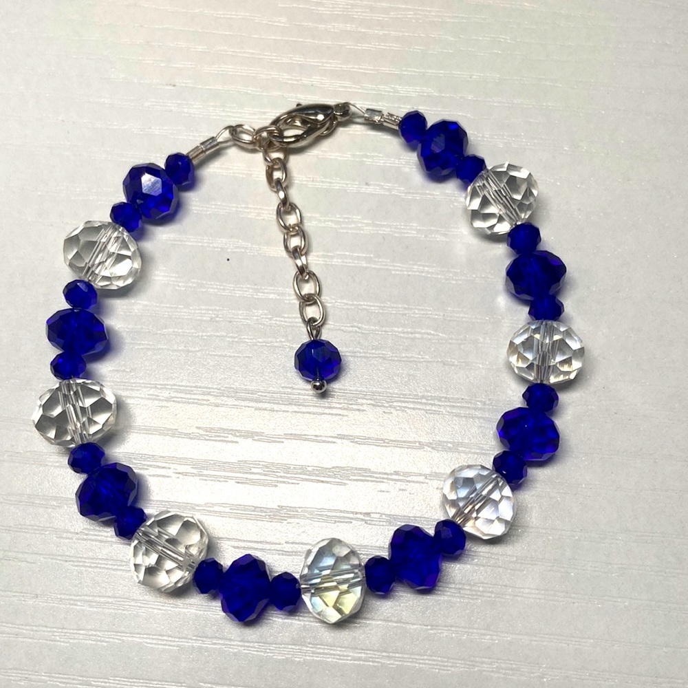 Dark blue and clear glass beaded bracelet.